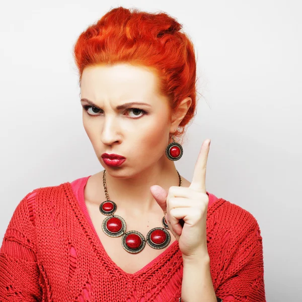 Young woman showing thumbs up gesture — Stock Photo, Image