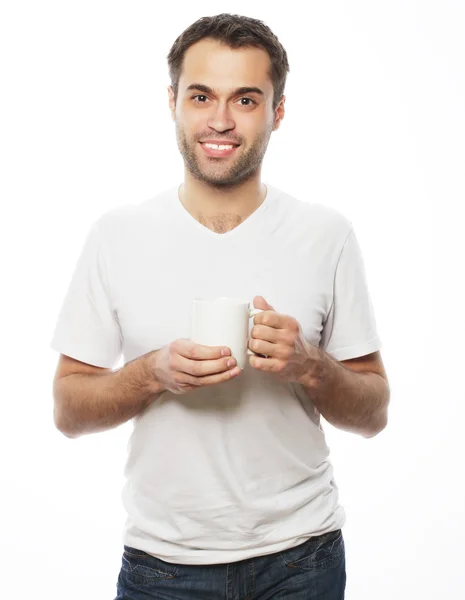 Hombre sosteniendo taza blanca con café — Foto de Stock