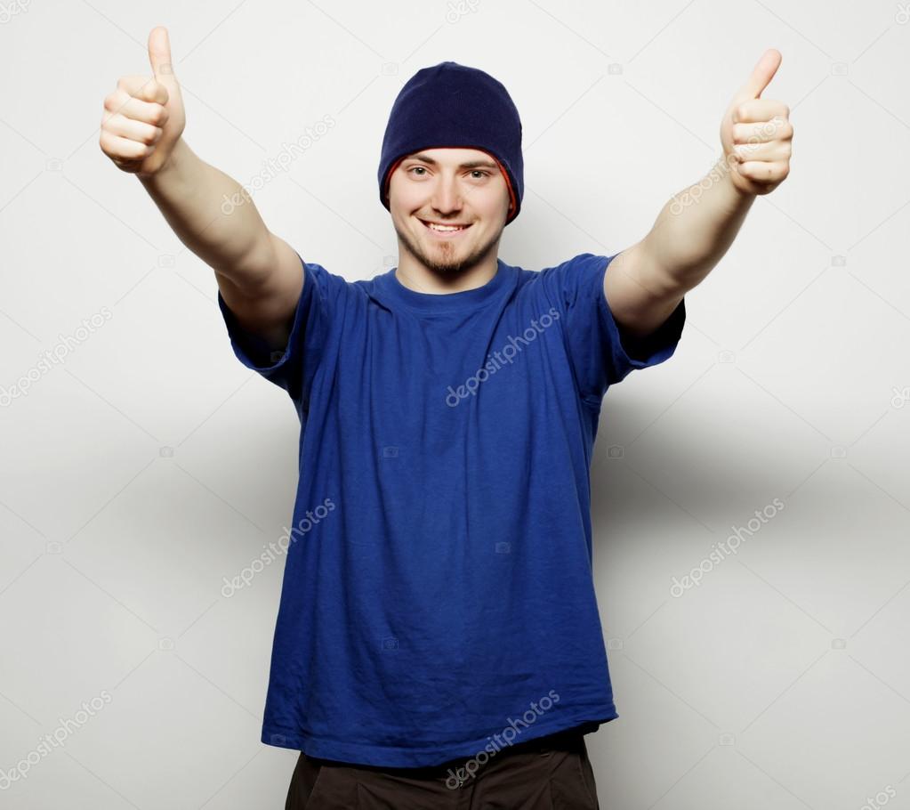 man in blue t-shirt and blue hat.