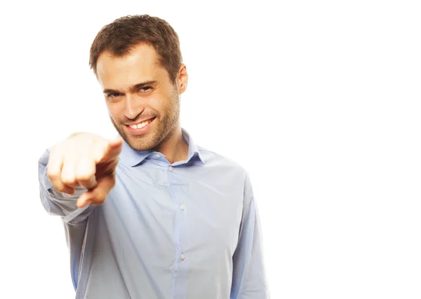 Hombre de negocios mostrando el dedo para ser el número uno — Foto de Stock