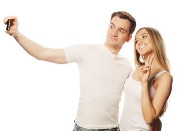 Çift smartphone ile gülümseyen
