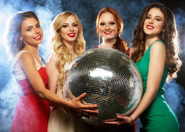 Party girls with disco ball — Stock Photo, Image