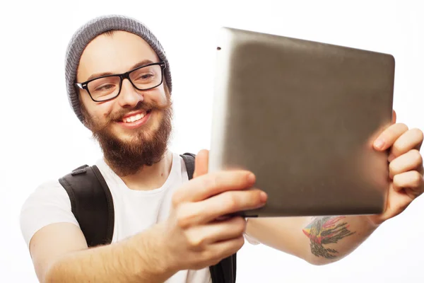 Young bearded man holding tablet — Stock Photo, Image