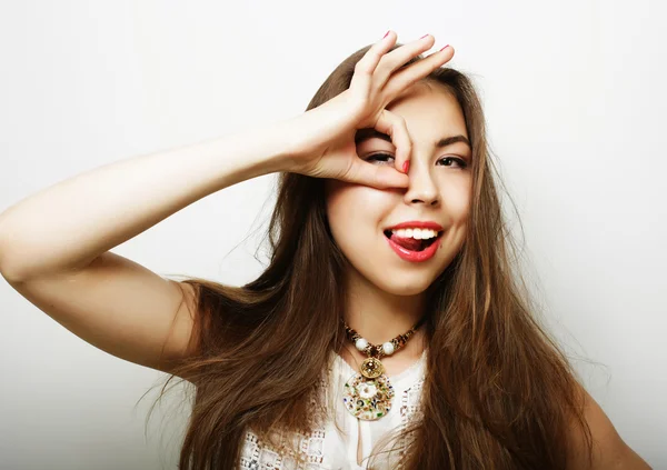 Woman looking for something with wide open eyes — Stock Photo, Image