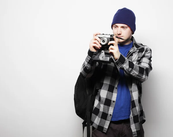 Young  photographer over white background — Stock Photo, Image