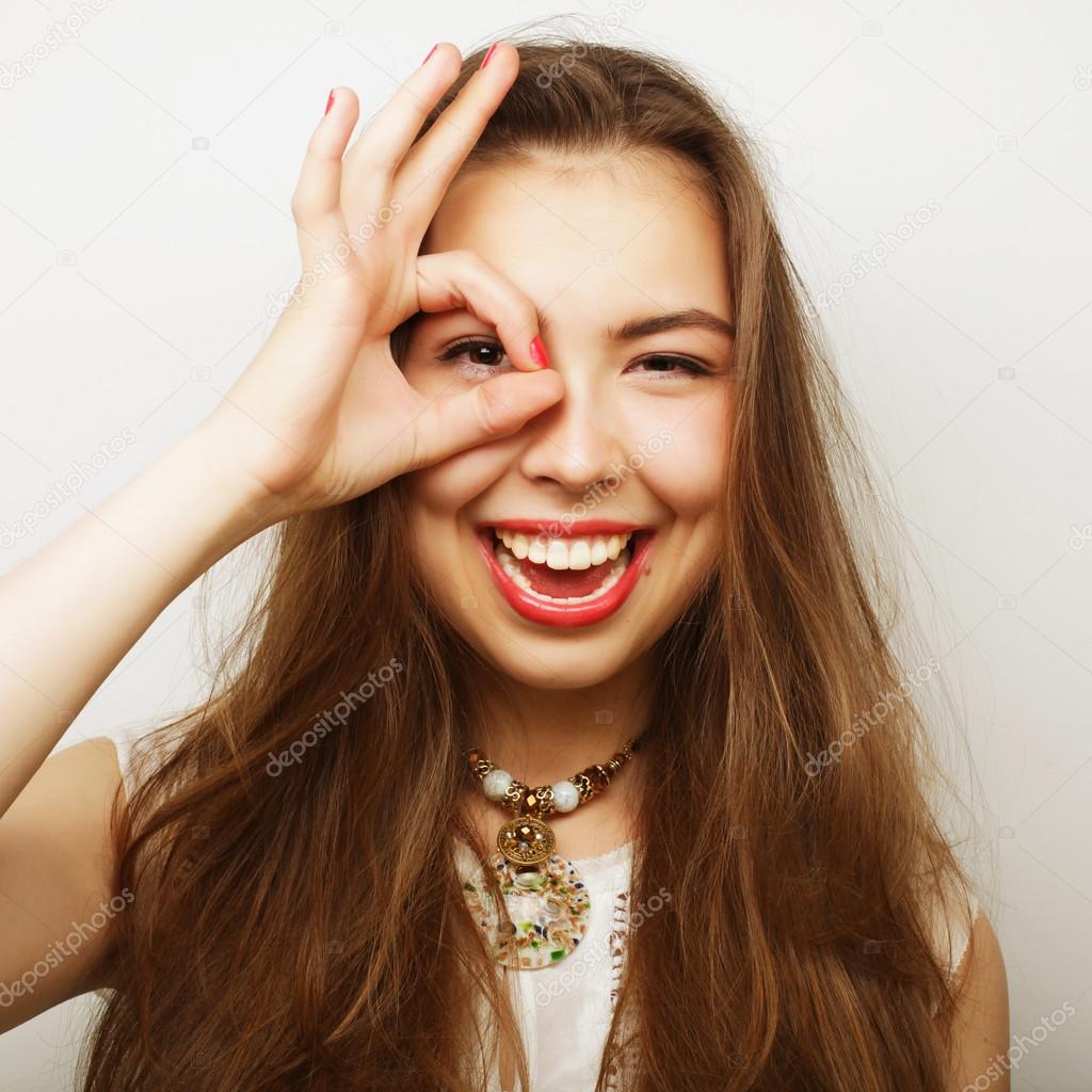  woman looking for something with wide open eyes 