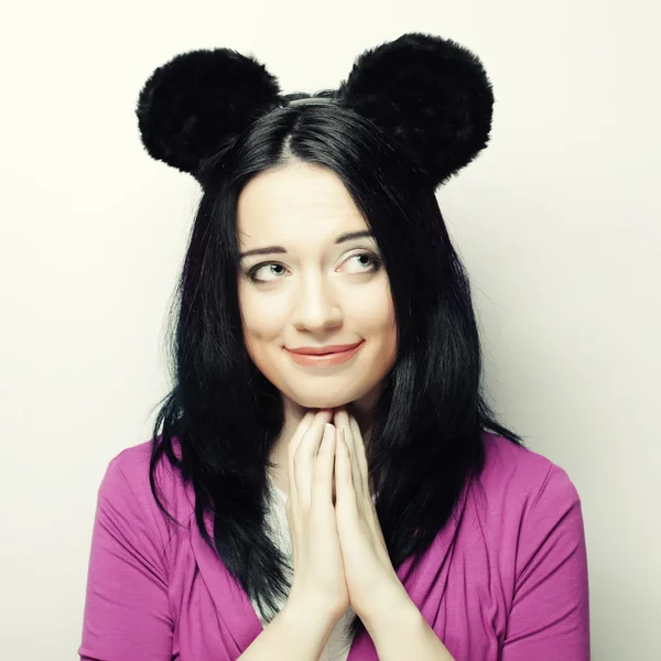 Surprised young woman with mouse ears — Stock Photo, Image