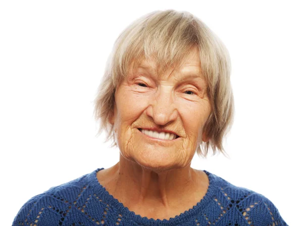 Happy senior woman against white — Stock Photo, Image