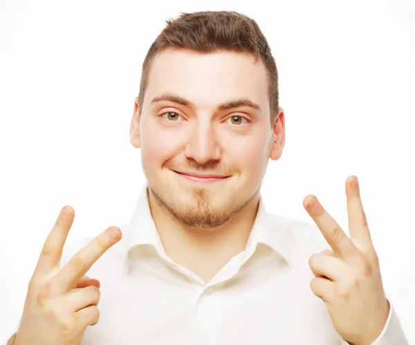 Business man giving the victory sign — Stock Photo, Image