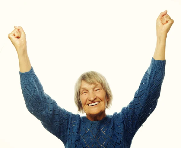 Vrolijke senior vrouw gebaren overwinning — Stockfoto