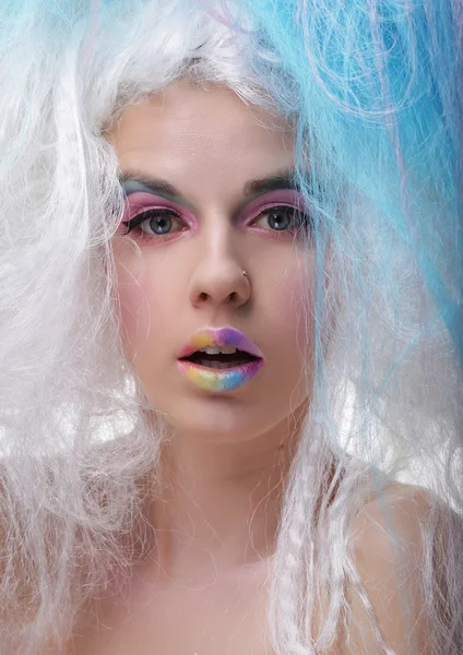 Young woman with bright make up and creative hair — Stock Photo, Image