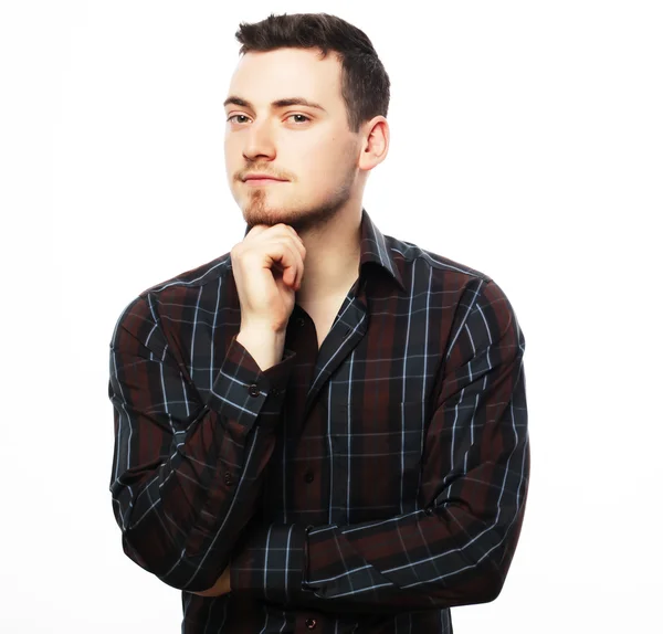 Handsome young man in shirt looking at camera — Stock Photo, Image