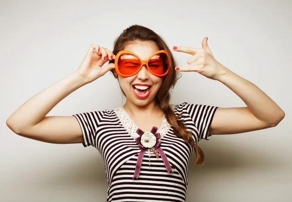 Young woman with big party glasses — Stock Photo, Image