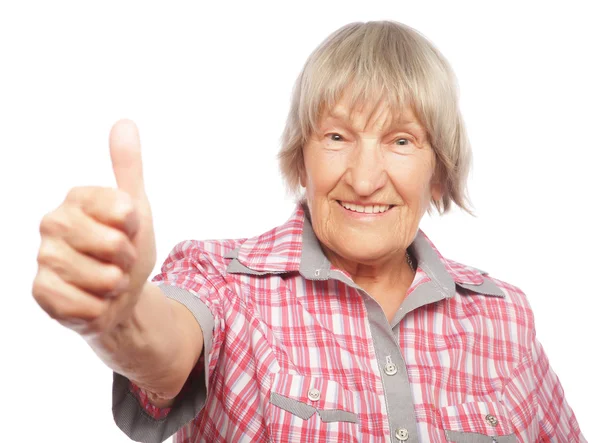 Oude vrouw weergegeven: ok teken op een witte achtergrond — Stockfoto