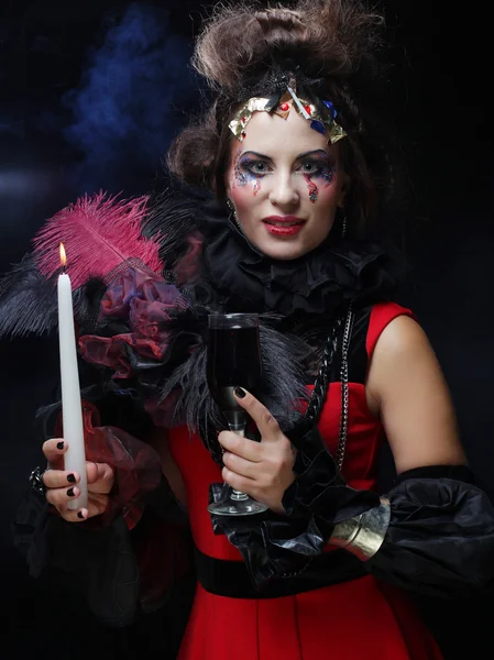 Ung kvinna med kreativ make up. Halloween-tema. — Stockfoto