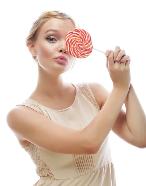 Fashion blond woman  holding lollipop — Stock Photo, Image