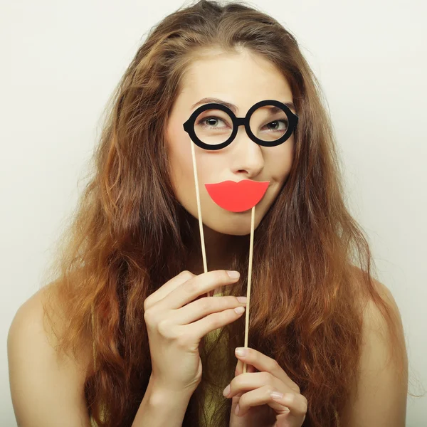 Speelse jonge vrouw klaar voor feest — Stockfoto