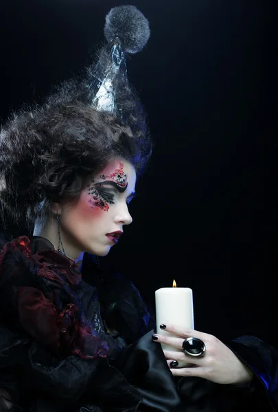 Junge Frau mit kreativem Make-up. Halloween-Thema. — Stockfoto