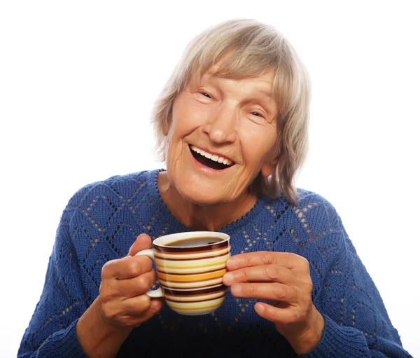 Velha senhora feliz com café — Fotografia de Stock