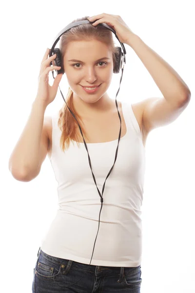 Woman with headphones listening music . Music teenager girl isol Stock Picture