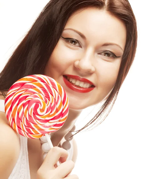 Vacker kvinna med lollipop. — Stockfoto
