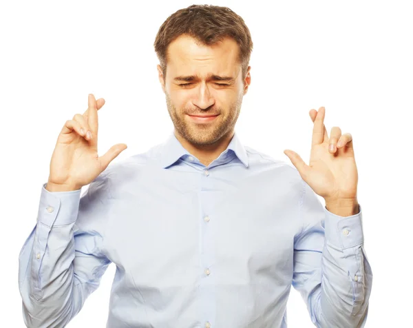 Business man in shirt keeping fingers crossed — Stock Photo, Image