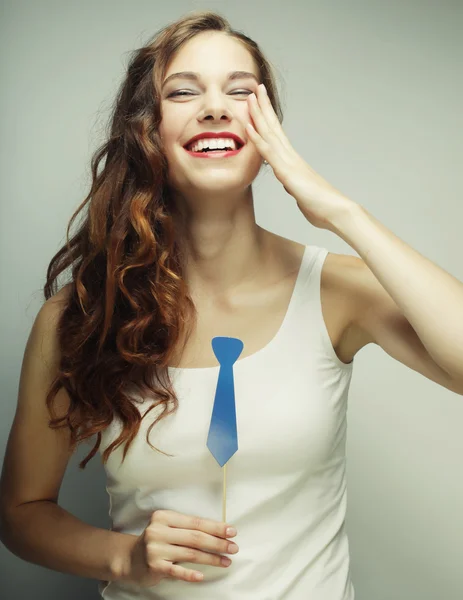 Speelse jonge vrouw klaar voor feest — Stockfoto