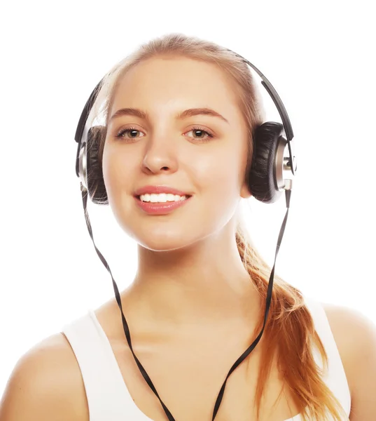 Mujer con auriculares escuchando música. Música adolescente chica isol —  Fotos de Stock