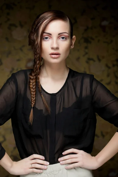 Beautiful fashion model with a creative hairstyling — Stock Photo, Image