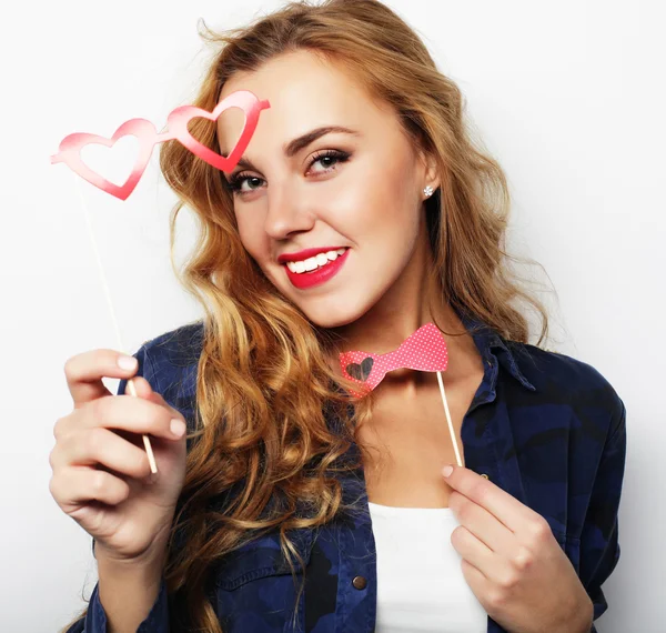 Party image. Playful young woman holding a party glasses. — Stock Photo, Image