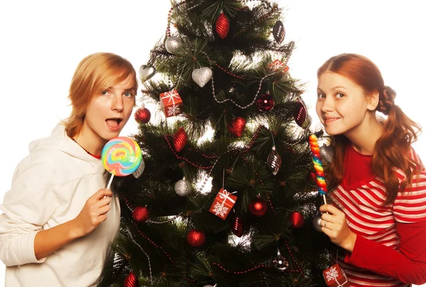 Duas meninas engraçadas com pirulito-pop . — Fotografia de Stock