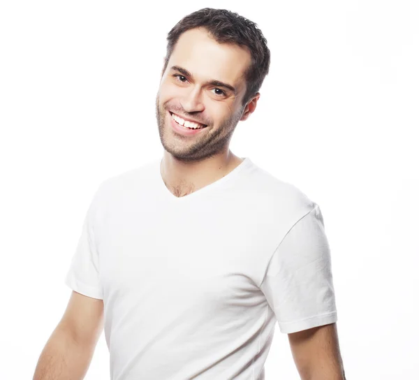 Hombre guapo en camisa blanca en blanco — Foto de Stock