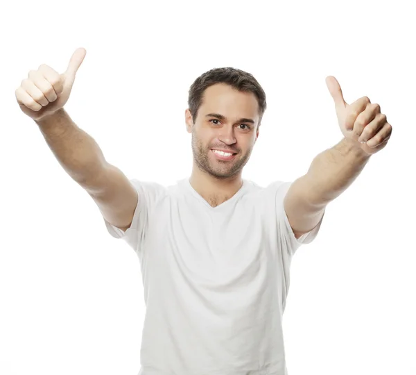 Happy handsome man showing thumbs up — Stock Photo, Image