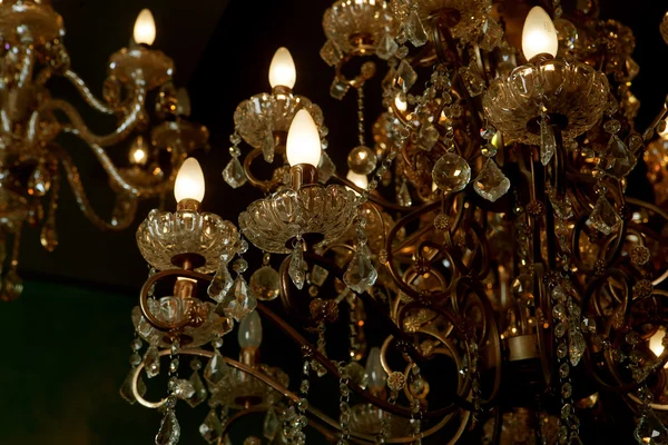 Beautiful vintage crystal chandelier in a room — Stock Photo, Image