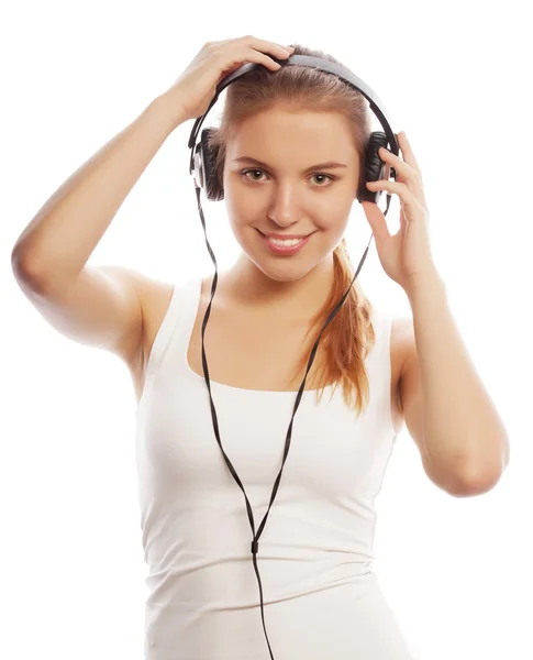 Mujer con auriculares escuchando música. Música adolescente chica isol —  Fotos de Stock