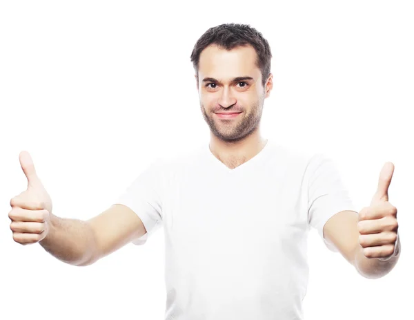 Happy handsome man showing thumbs up — Stock Photo, Image
