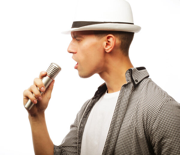 young man singing with microphone