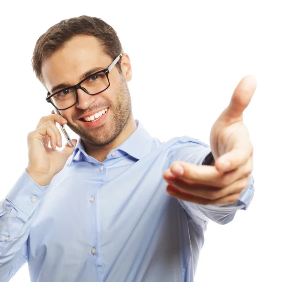 Successful gesturing business man with mobile — Stock Photo, Image