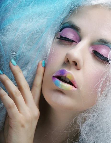 Young woman with bright make up and creative hair — Stock Photo, Image
