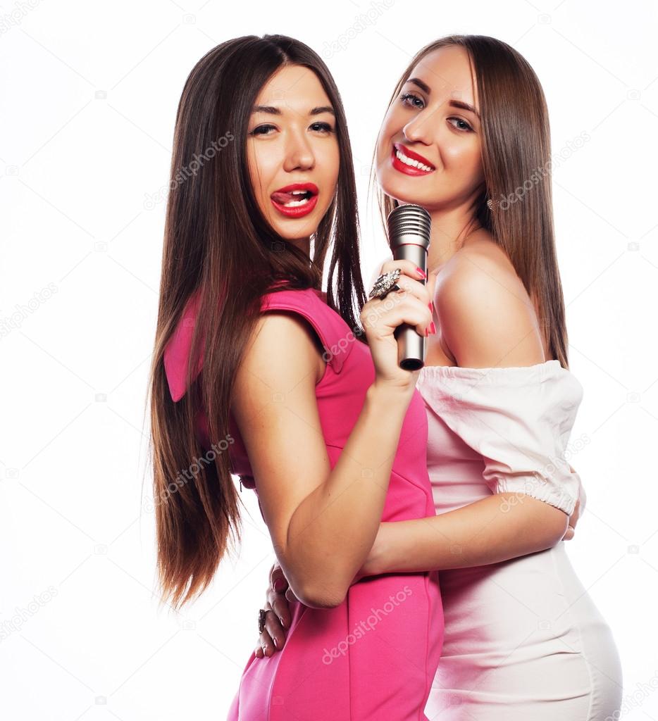 sensual girls singing with microphone