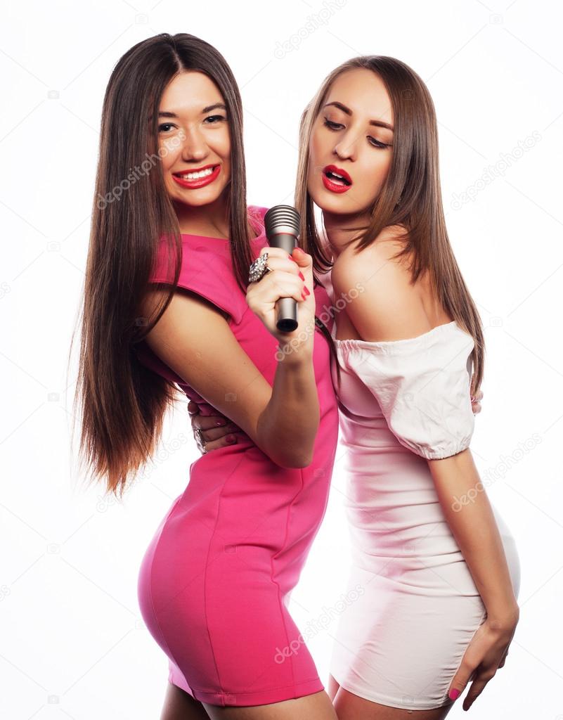 sensual girls singing with microphone