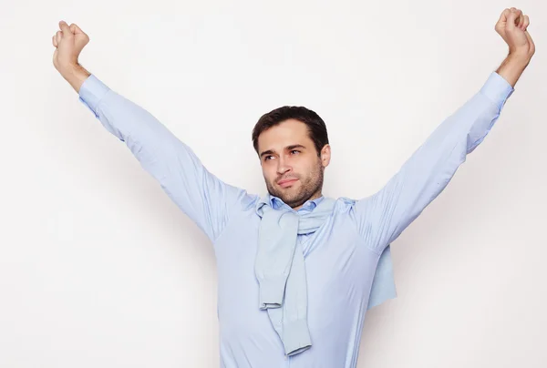 Happy young man in blue shirt. — Stock Photo, Image