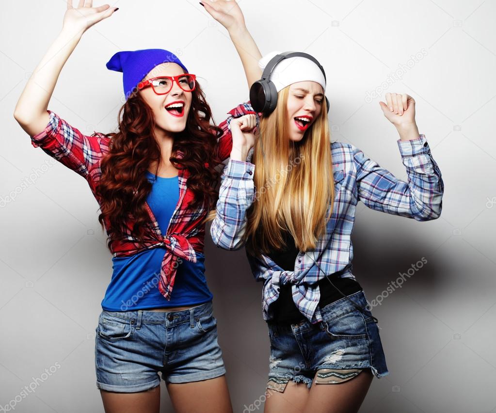 beauty hipster girls with a microphone