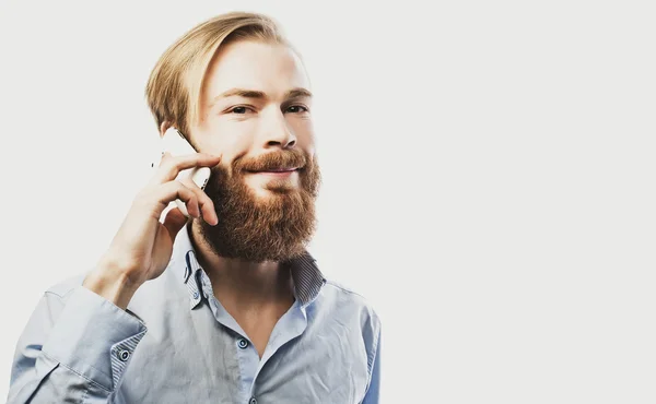 Young man talking on mobile — Stock Photo, Image