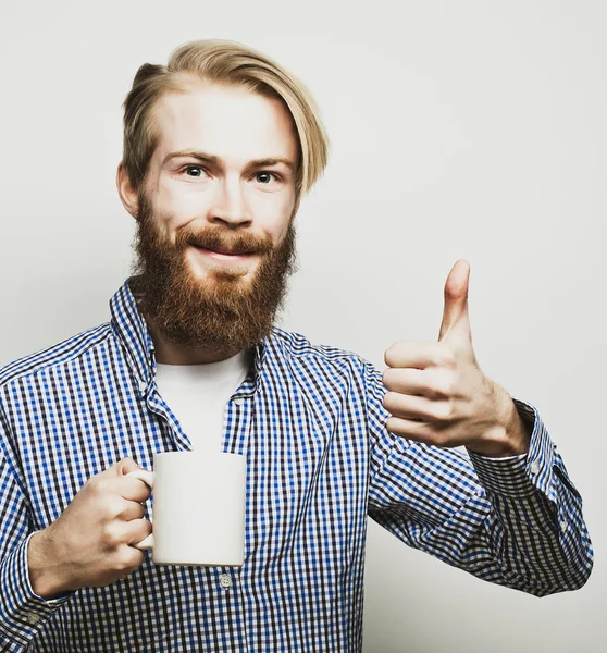 Άνθρωπος με ένα φλιτζάνι καφέ — Φωτογραφία Αρχείου