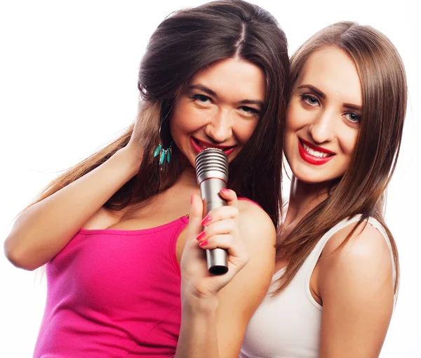 Sensual girls singing with microphone — Stock Photo, Image