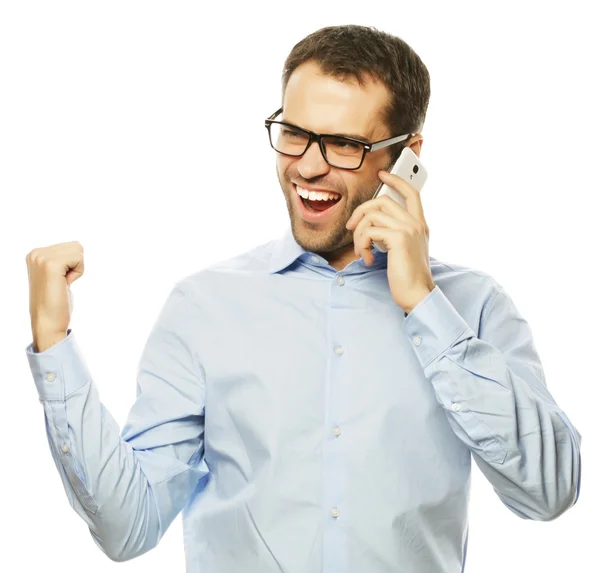 Успешный жест делового человека с мобильным телефоном — стоковое фото