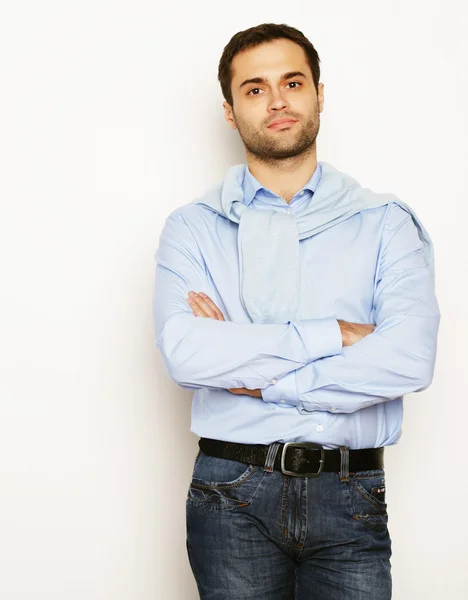 Happy young man in blue shirt. — Stock Photo, Image