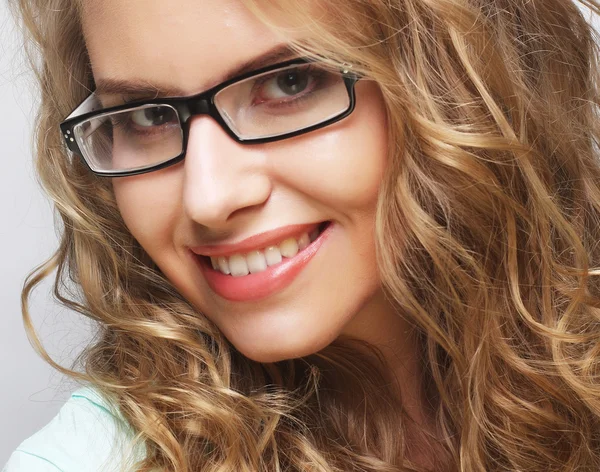 Friendly blond woman with glasses — Stock Photo, Image