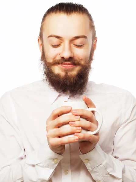 Ung mand drikker en kop kaffe - Stock-foto